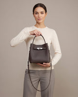Aubrine Armelle Bucket Bag in Chocolate, held