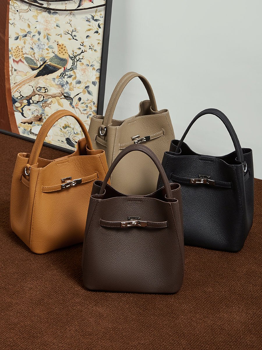 Aubrine Armelle Bucket Bag in Chocolate, worn on the shoulder