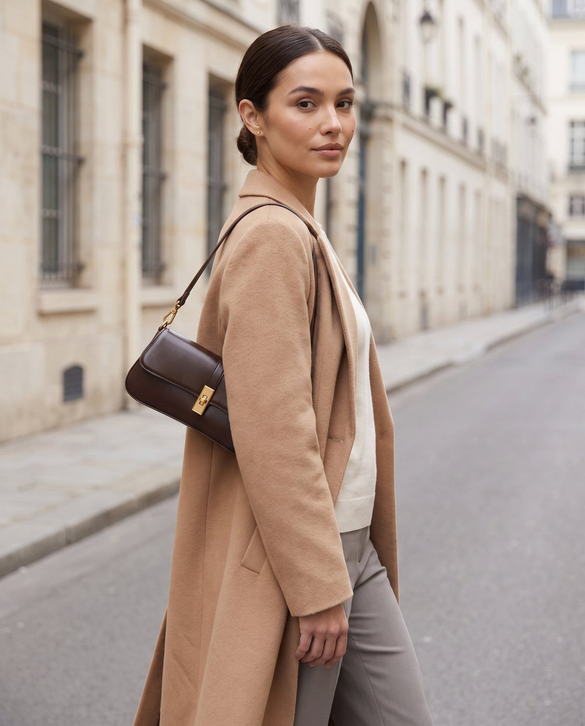 Aubrine Constance Baguette Bag in Black, worn on the shoulder