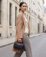 Aubrine Eleonore Vanity Bag in Black, worn on the shoulder
