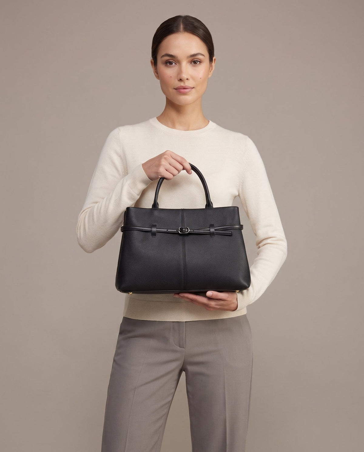 Aubrine Ernestine Satchel in Black, held