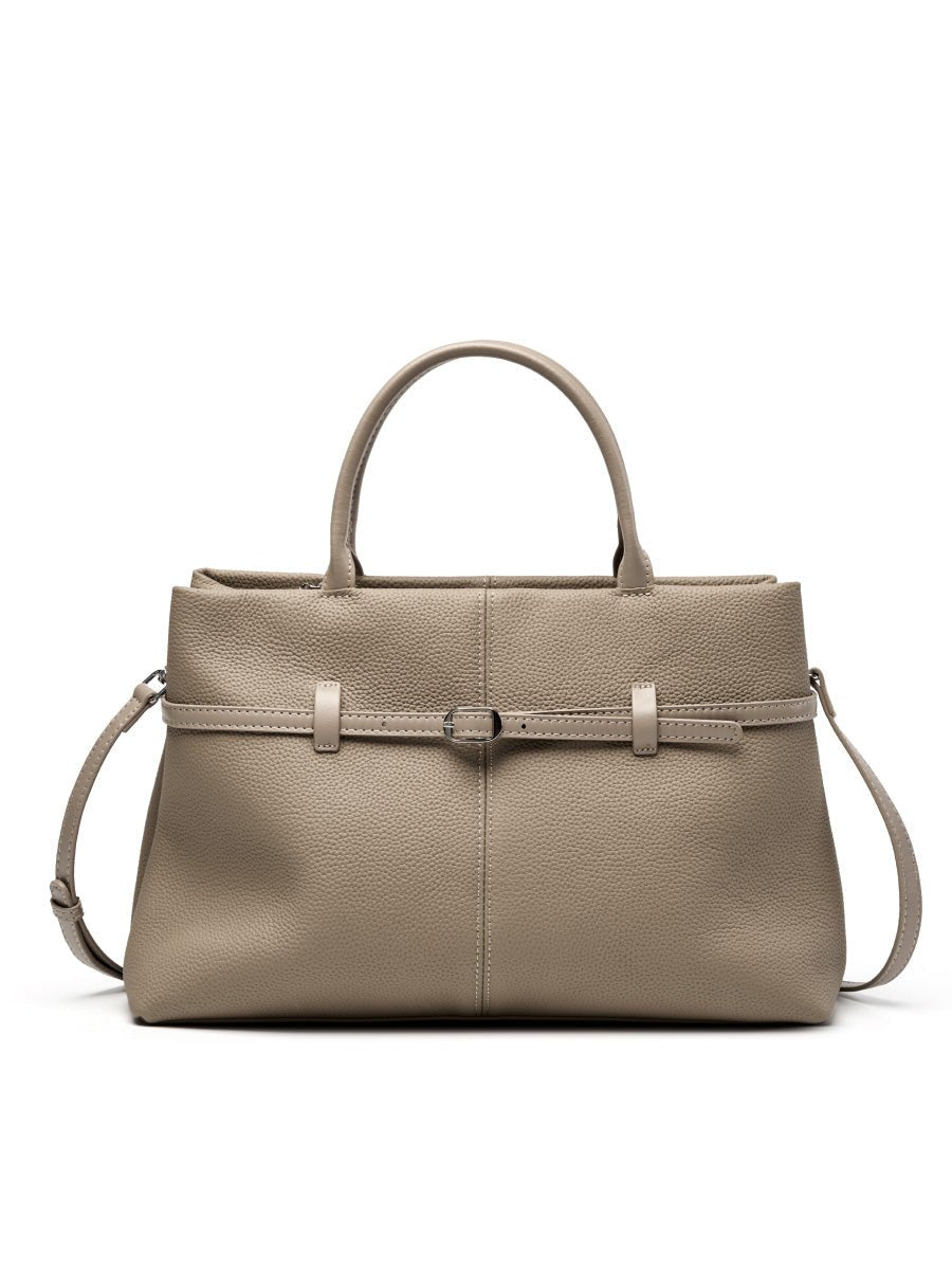 Aubrine Ernestine Satchel in Black, worn on the shoulder