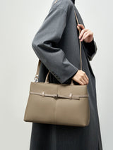 Aubrine Ernestine Satchel in Black, worn